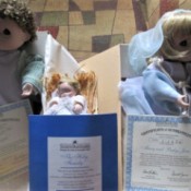 Value of Ashton Drake Figurines - Precious Moments Holy Family figurines in boxes