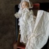 Value of a Brinn Baby Doll - doll in a long christening style dress and bonnet