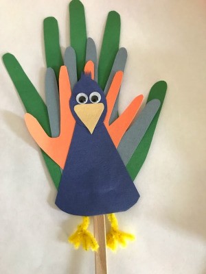 Peacock Popsicle Stick Puppet - finished puppet