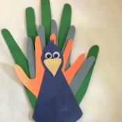 Peacock Popsicle Stick Puppet - finished puppet