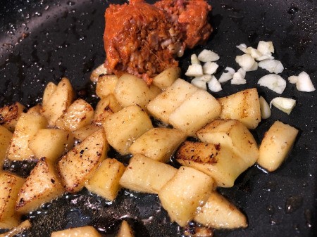 adding Chorizo, spice, and garlic to Apple