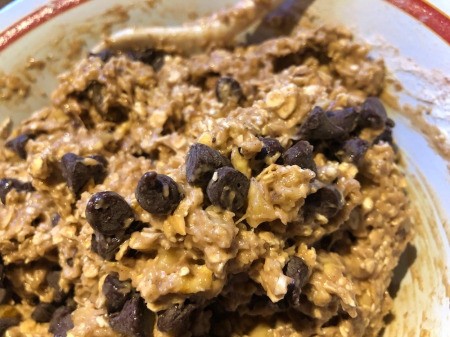 adding chocolate chips to batter