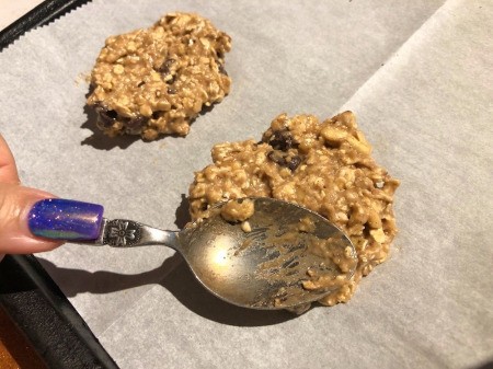 spooning batter on baking tray