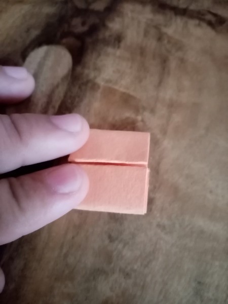 Making a Paper Worm Race Game - continue folding until the two sides meet in the center