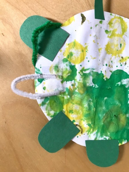 Personalized Turtle Wall Art Using Old Art - make a hanger from a pipe cleaner and tape to the back of the shell