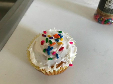 sprinkles on Piñata Cupcakes