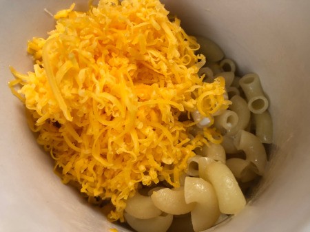 cheese added to macaroni