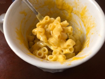 melted cheese and cooked macaroni