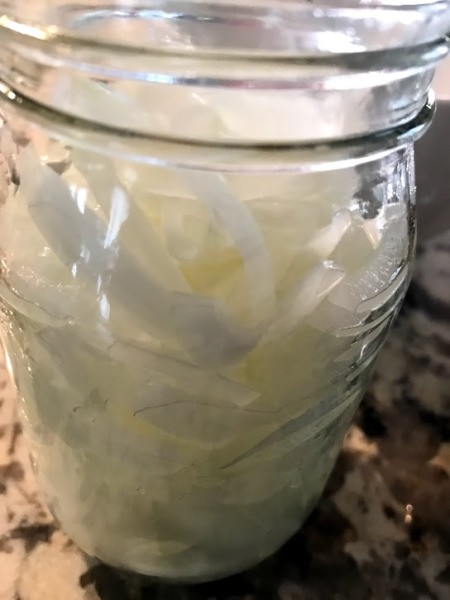 sliced Onions in jar
