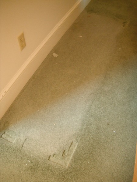 Cleaning a Bedroom By Yourself - view of carpet under dresser prior to cleaning