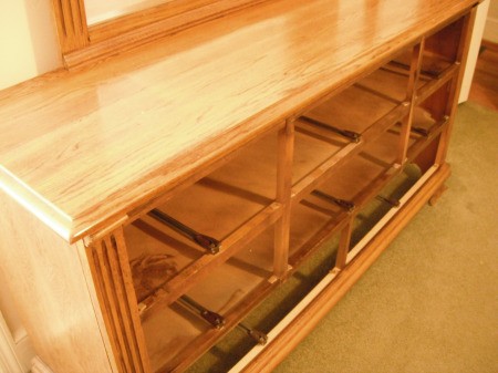 Cleaning a Bedroom By Yourself - drawers removed from dresser for cleaning inside and moving to clean floor and wall