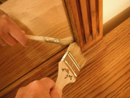 Cleaning a Bedroom By Yourself - using a paint brush to clean mirror corners