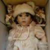 Value of Seymour Mann and Marie Osmond Dolls - doll in box wearing a pink dress