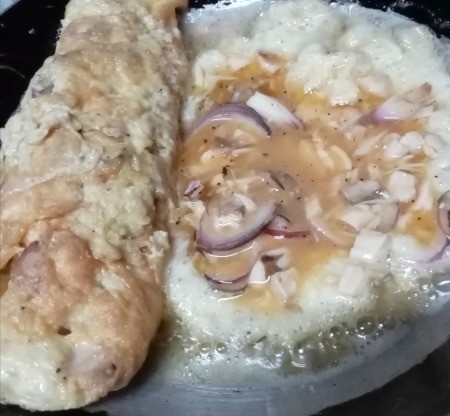 Chicken in Egg Rolled in pan