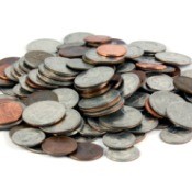 A pile of coins on a white background.