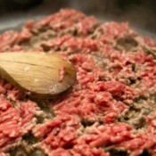 A pan of hamburger being cooked.