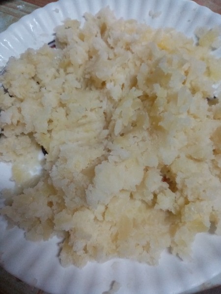 mashed cooked potatoes on plate