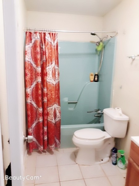 Decorating a Bathroom with a Blue Tub - plain small bathroom with blue tub and surround