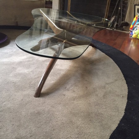 Value of an Asymmetrical Glass Top Coffee Table