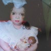 Identifying a Porcelain Doll - doll in box, holding a doll