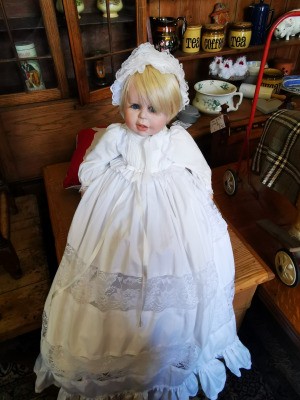 Identifying a Porcelain Doll - doll in white christening dress