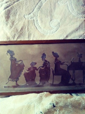 Identifying Framed Paper Cutout Silhouettes - woman playing a piano and others bowing and dancing
