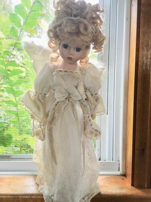 Identifying a Porcelain Doll - doll with wings