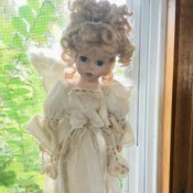 Identifying a Porcelain Doll - doll with wings