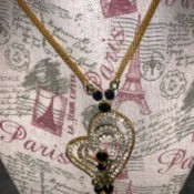 A heart shape costume jewelry necklace.