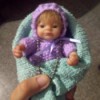 Value of an Ashton Drake Mini Baby Doll - small doll in crochet outfit
