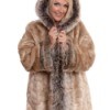 A woman wearing a faux fur jacket.