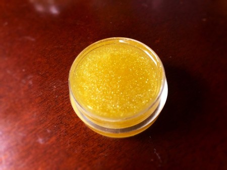 How to Make Natural Tinted Lip Balm - adding more tumeric for a brighter yellow will look peach when applied, pour into the third container and cap