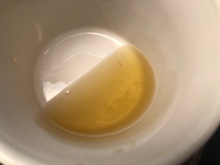 How to Make Natural Tinted Lip Balm - melt down the rest of the ingredients as before and add peppermint oil