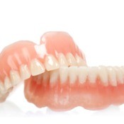 A pair of dentures on a white background.