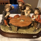Value of a Giuseppe Armani Capodimonte Figurine - kids playing cards around a round table