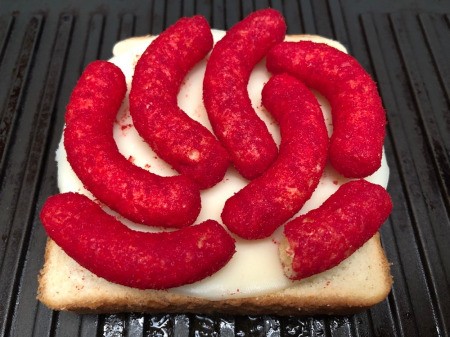 cheese & hot puffs on bread