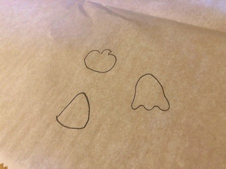 DIY Puffy Stickers from Hot Glue - draw sticker outlines on parchment paper
