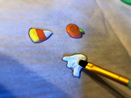 DIY Puffy Stickers from Hot Glue - paint on your base coat of paint, a drop of water added will improve the consistency of the paint making smoother, allow to dry