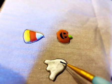 DIY Puffy Stickers from Hot Glue - add details with smaller brush and allow to dry