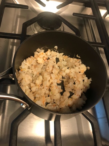 shrimp & garlic cooking in pan