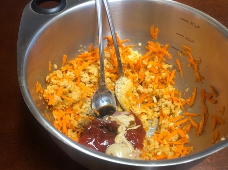 adding sauces to bread crumbs