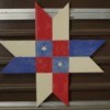Wooden Barn Star Quilt Pattern - red, white, and blue star with two white stars on blue center squares