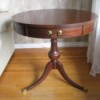 Value of a Mersman Table - round mahogany table with single drawer