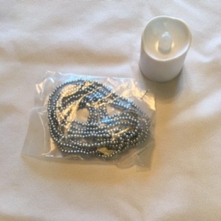 Wedding Reception Table Topper - the tea lights and strings of pearls for decorating the table topper