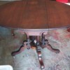 Identifying an Antique Drop Leaf Table - mahogany finish table with leaves open - has casters on the feet
