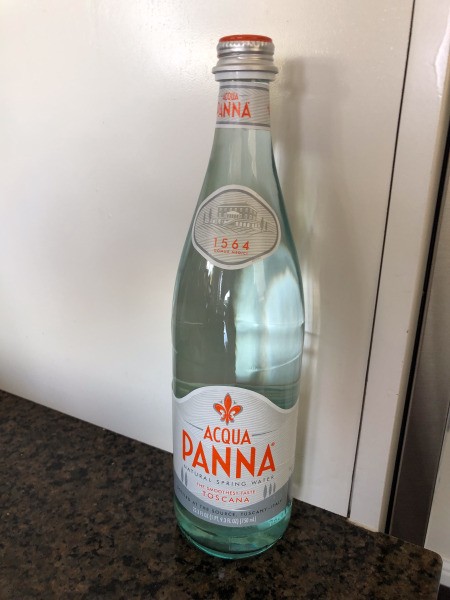 A bottle of Acqua Panna water.