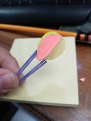 Making a Balloon Paper Clip Topper - hand holding the finished balloon paper clip