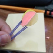 Making a Balloon Paper Clip Topper - hand holding the finished balloon paper clip