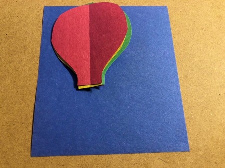 3D Hot Air Balloon Card - cut out a piece of blue paper for the card base/background