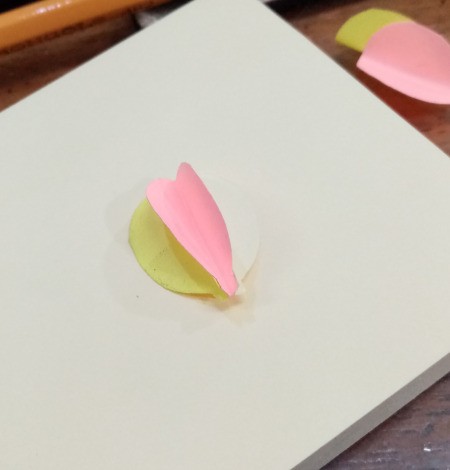 Making a Balloon Paper Clip Topper - glue the notes to each other in halves, see photo.